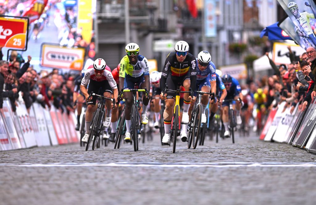 BINCHE BELGIUM OCTOBER 01 LR Milan Fretin of Belgium and Team Cofidis Biniam Girmay of Eritrea and Team Intermarche Wanty race winner Arnaud de Lie of Belgium and Team Lotto Dstny and Jasper Philipsen of Belgium and Team Alpecin Deceuninck sprint at finish line during the 37th Binche Chimay Binche Memorial Frank Vandenbroucke 2024 a 1986km one day race from Binche to Binche on October 01 2024 in Binche Belgium Photo by Luc ClaessenGetty Images