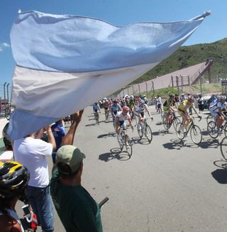 An Argentinean fan watches cyclist at the Tour San Luis