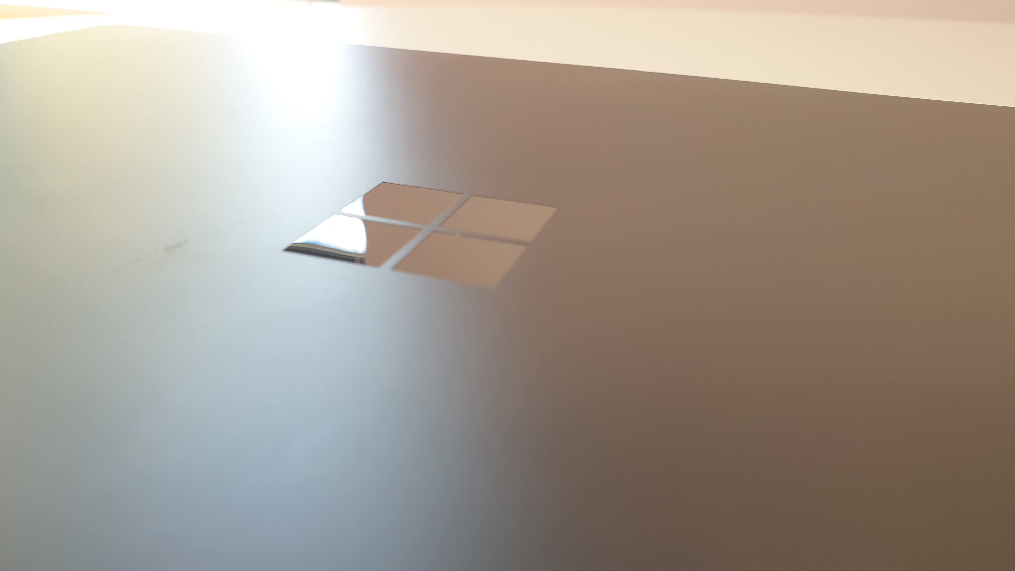 Surface Laptop 4 on a wooden table in an office