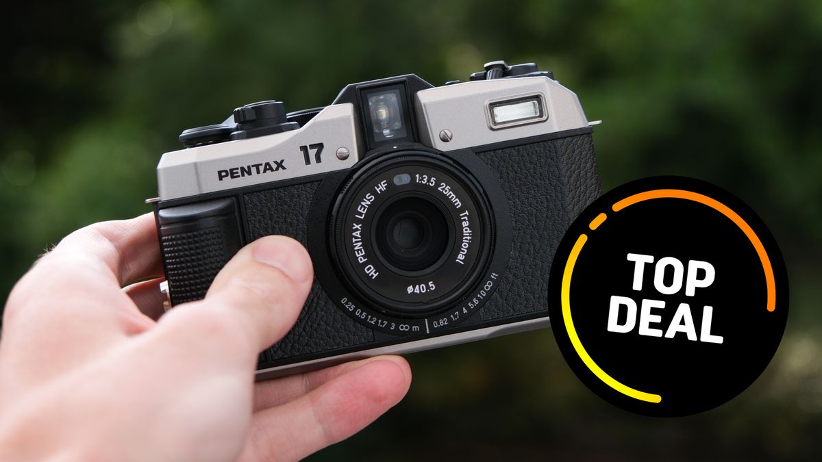 Pentax 17 camera being held in someone&#039;s hand with Top Deal sticker