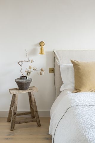 A clear and uncluttered bedside table