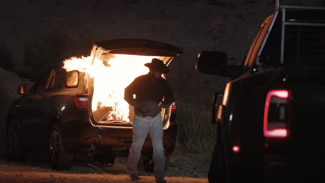 Screenshot of Rip setting fire to a car in Yellowstone Season 5B