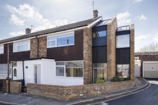 semi detached house with two-storey side extensions