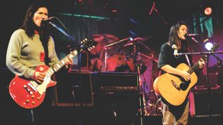 Kelley (left) and Kim Deal perform with the Breeders on MTV Live and Loud, opening for Nirvana, 1993