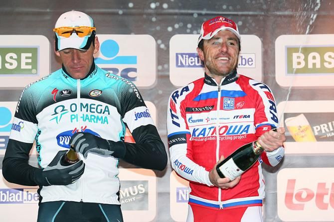 Stijn Vandenbergh and Luca Paolini open champagne