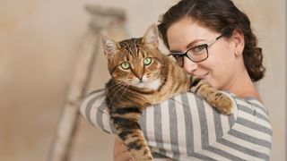 Woman holding cat