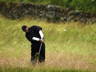 Tiger Woods toils at Muirfield in 2002