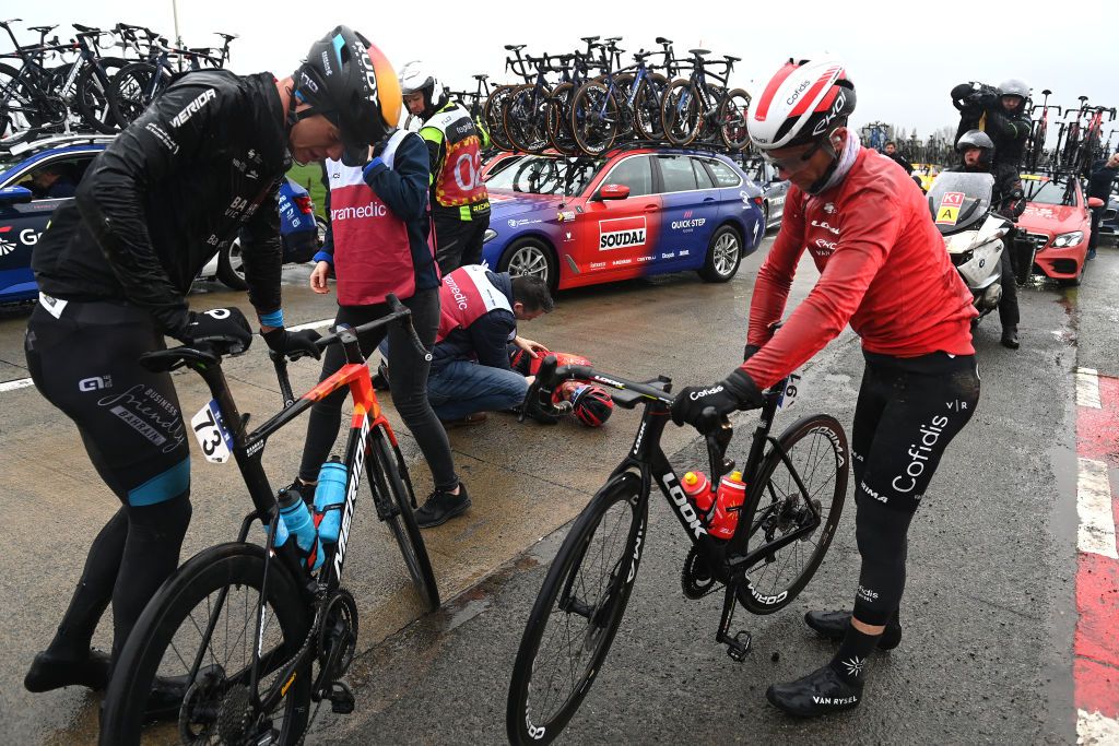 WEVELGEM BELGIUM MARCH 26 LR Jonathan Milan of Italy and Team Bahrain Victorious and Piet Allegaert of Belgium and Team Cofidis after being involved in a crash during the 85th GentWevelgem in Flanders Fields 2023 Mens Elite a 2609km one day race from Ypres to Wevelgem UCIWT on March 26 2023 in Wevelgem Belgium Photo by Tim de WaeleGetty Images