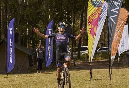 Celebrating the stage 4 win at 2023 Migration Gravel Race is Lucas Baum (ORBEA x Leatt x Speed Company)