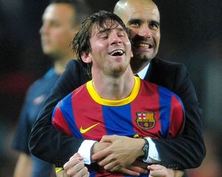 Barcelona manager Pep Guardiola embraces Lionel Messi after victory over Real Madrid in the 2011 Champions League semi-final