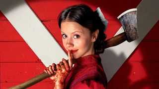 Mia Goth as Pearl, holding an axe in the &quot;Pearl&quot; poster