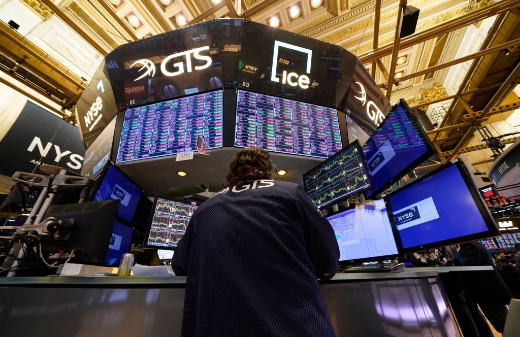 stock trader on floor of New York Stock Exchange 