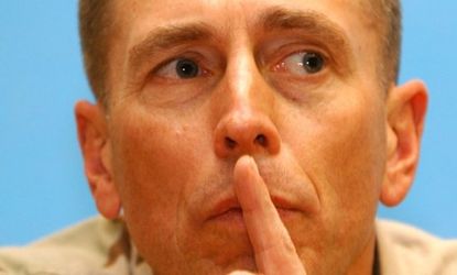 Gen. David Petraeus pauses during a media conference in 2004