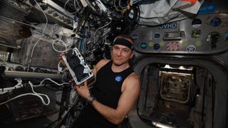 Canadian astronaut David Saint-Jacques testing the Astroskin health-monitoring undershirt on the International Space Station.