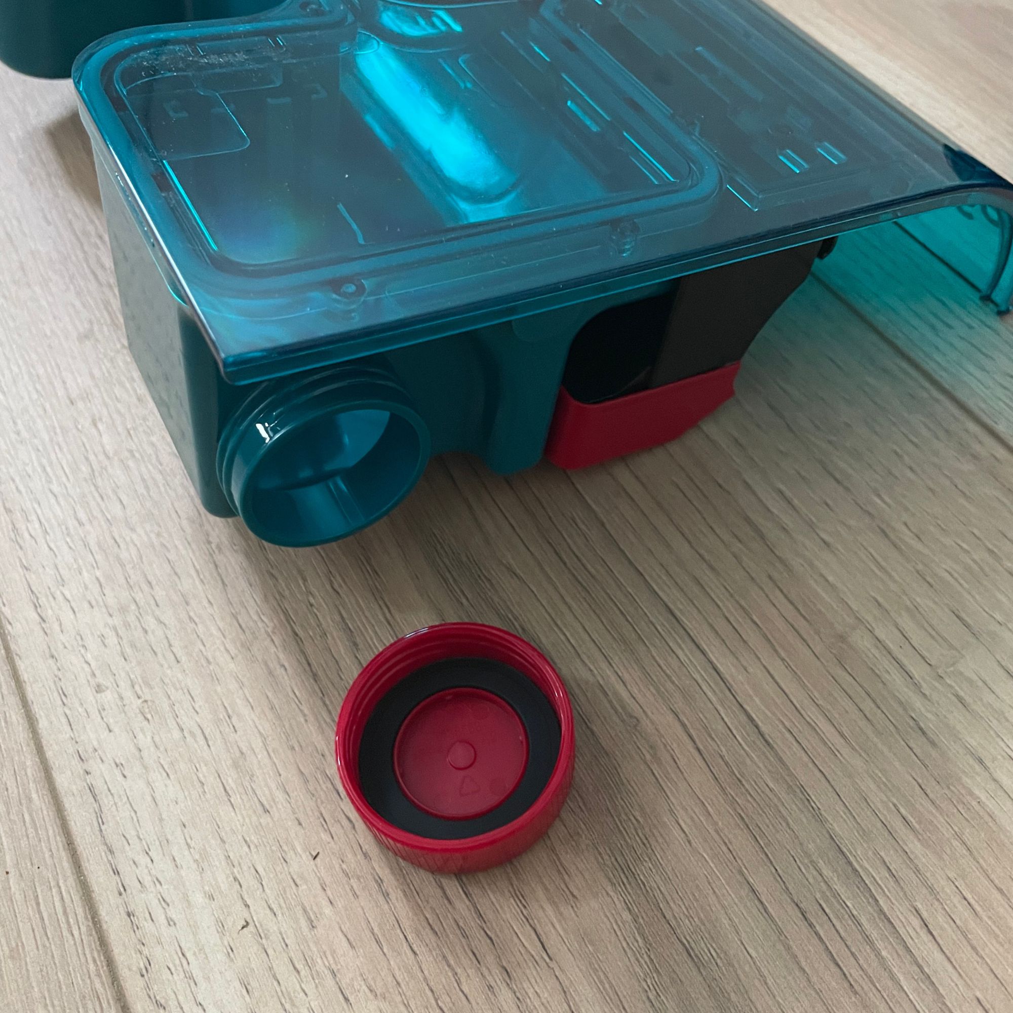 Dyson Clean+Wash Hygiene floorhead with the dirty water tank lid screwed off