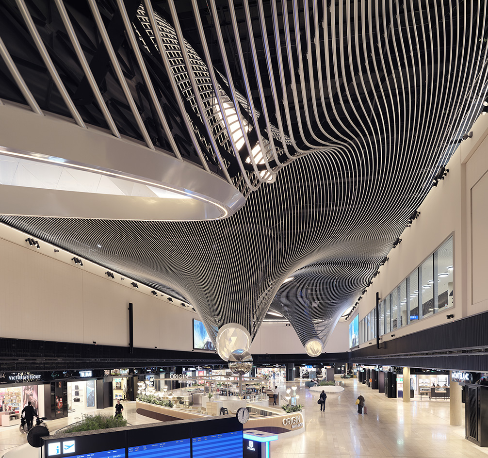 Frankfurt Airport interior The Marketplace, designed by LAVA, a flowing organic ceiling design with a skylight