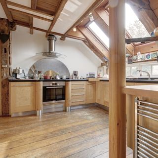 watermill kitchen with white wall and wooden cabinet