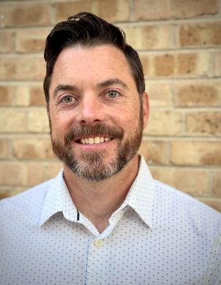 Smiling headshot of John Born.