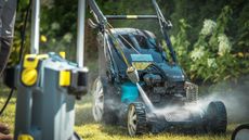 Pressure washing a lawn mower