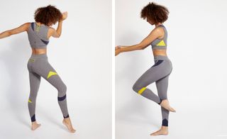 Model wears grey leggings and sports bra with bold clock colour inserts