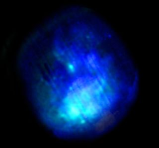 The supernova remnant W44 is shown by XMM-Newton at high (light blue) and low (dark blue) energy X-ray emission in this ESA image. Pulsar PSR B1853+01 appears as the bright light blue point at the top left. The striping is a result of the image processing.