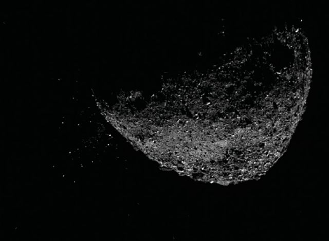 An image from NASA&#039;s OSIRIS-REx spacecraft shows material being ejected from the surface of asteroid Bennu on Jan. 6, 2019.