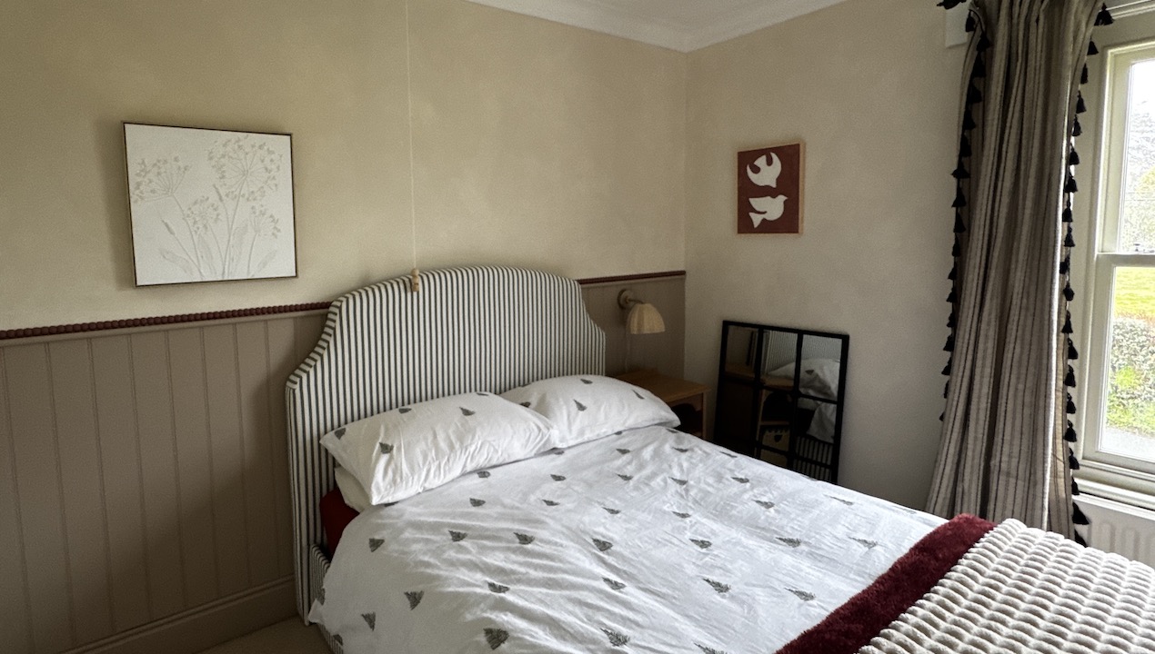 bedroom with lime washed walls