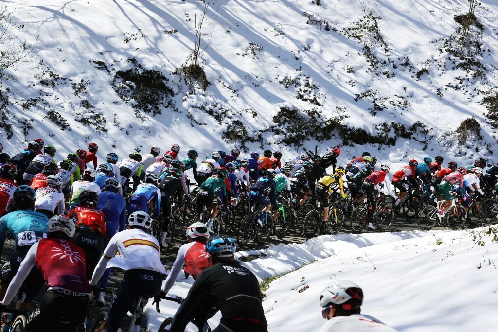 VIANA SPAIN APRIL 05 A general view of the Peloton passing through a snowy landscape during the 61st Itzulia Basque Country 2022 Stage 2 a 2076km stage from Leitza to Viana 461m itzulia WorldTour on April 05 2022 in Viana Spain Photo by Gonzalo Arroyo MorenoGetty Images