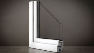 Cutaway of triple glazed window on grey background