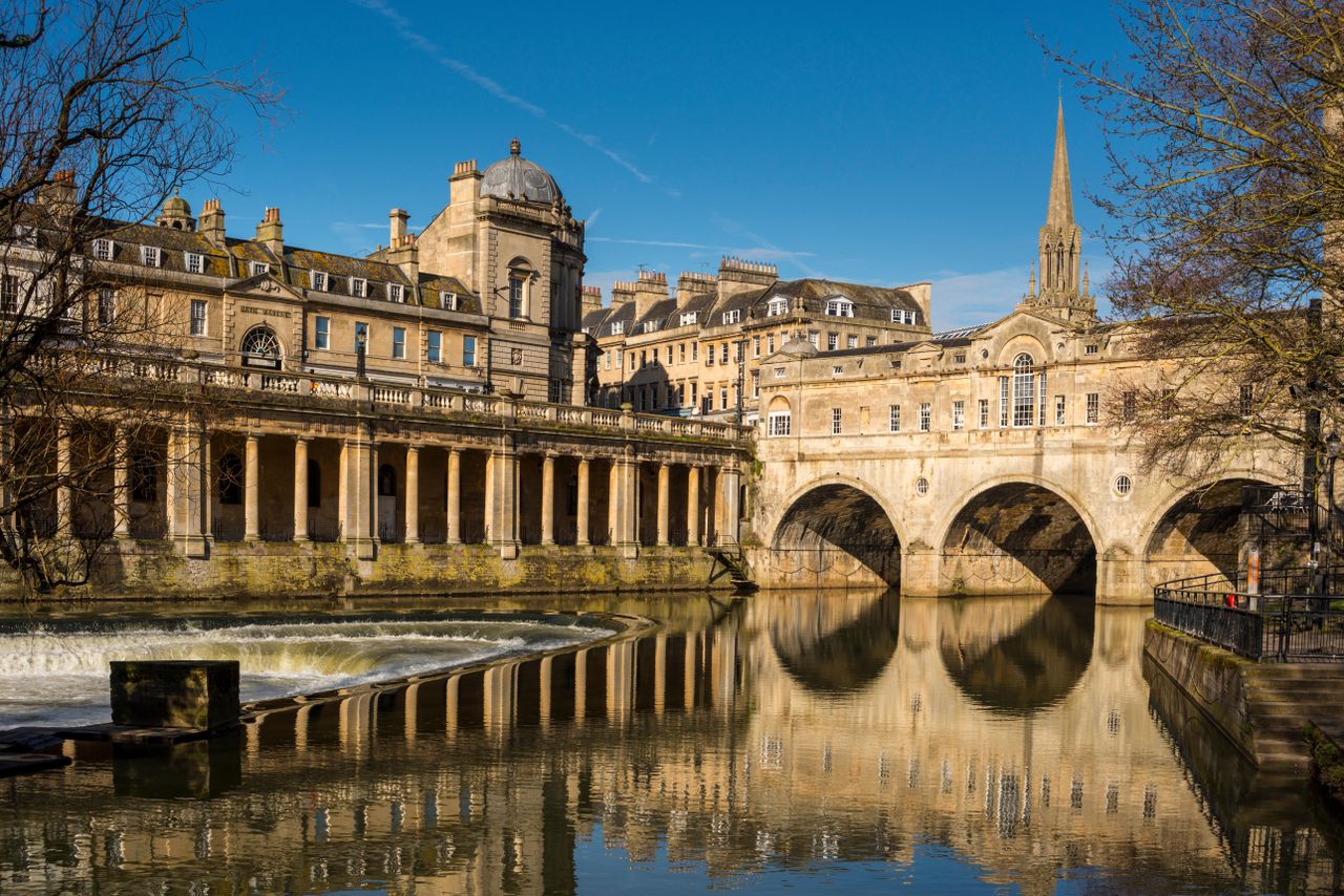 Cityscape of Bath depicting St Michael&#039;s Without Church, Pultney Bridge and River Avon, Somerset, UK