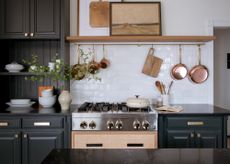 kitchen with open shelving and artwork by Urbanology
