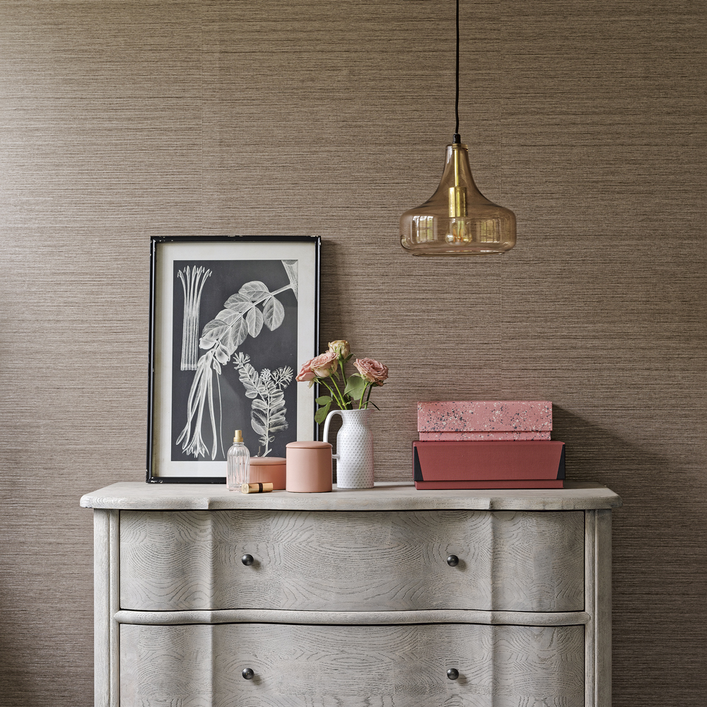 living room with hanging lamp light and photo frame