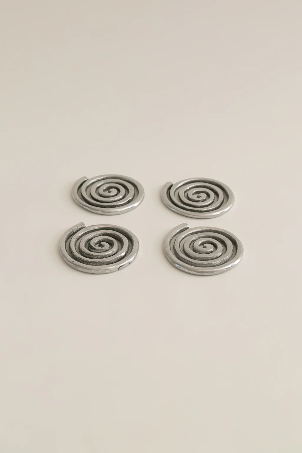 Sophie Lou Jacobsen Etagere Spiral Set of Eight Nickel-Plated Coasters