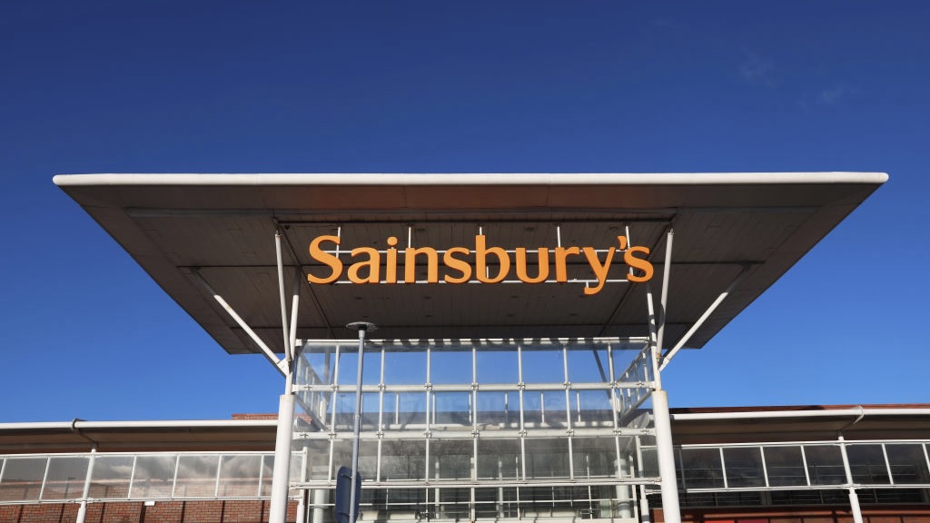 The exterior entrance of a Sainsbury's supermarket.