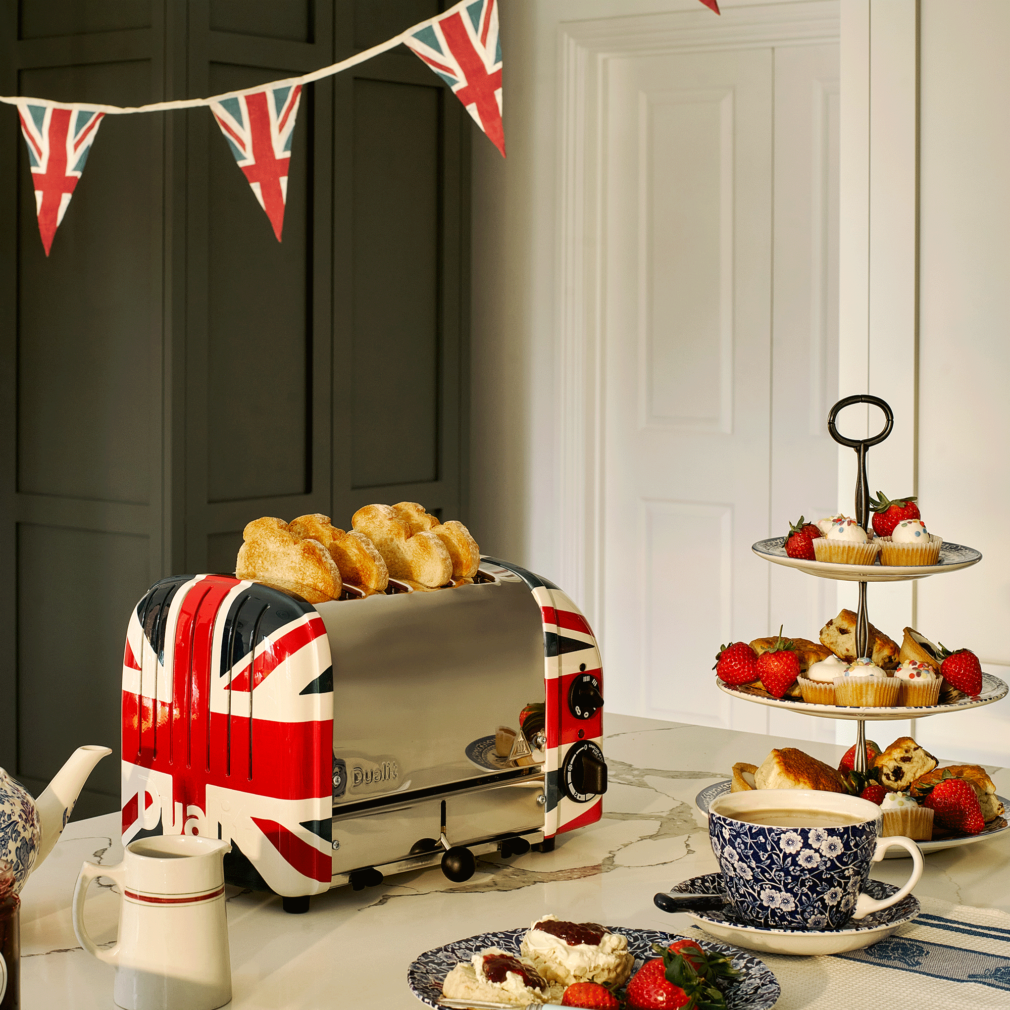 Dualit union jack toaster in a green kitchen