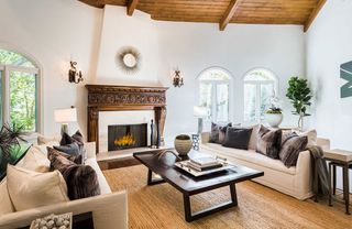 living room with sofa set and fire place