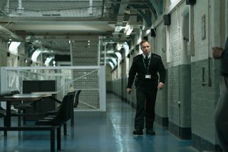 Stephen Graham as prison officer Eric.