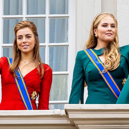 Princess Alexia and Princess Catharina Amalia waving in evening gowns
