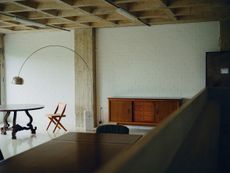 1OAM lofts interiors, midcentury furniture and raw brutalist concrete surfaces
