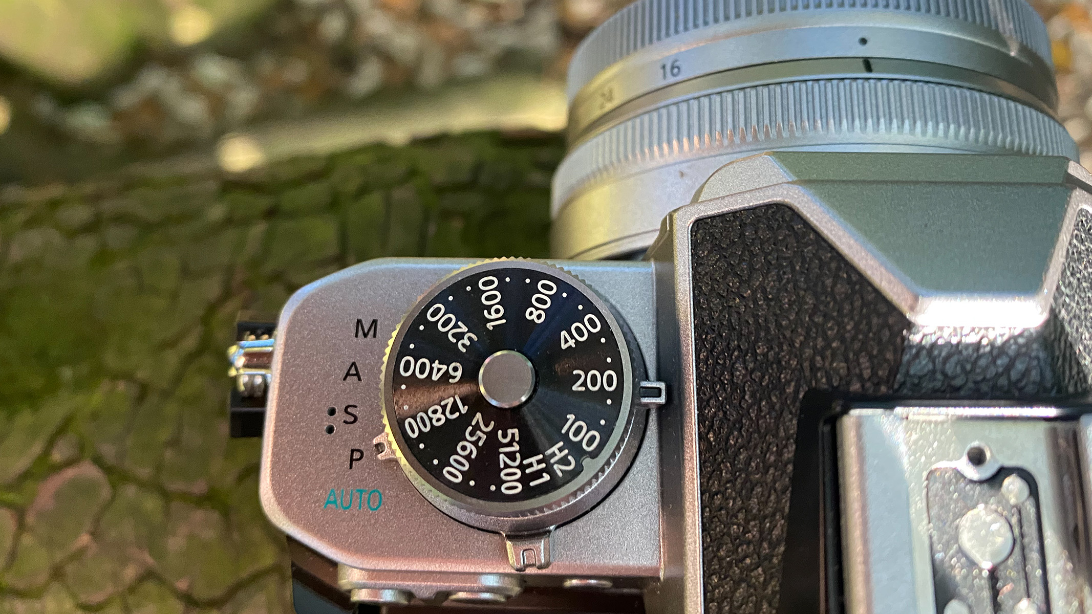 Image shows the ISO control on the top left of the camera