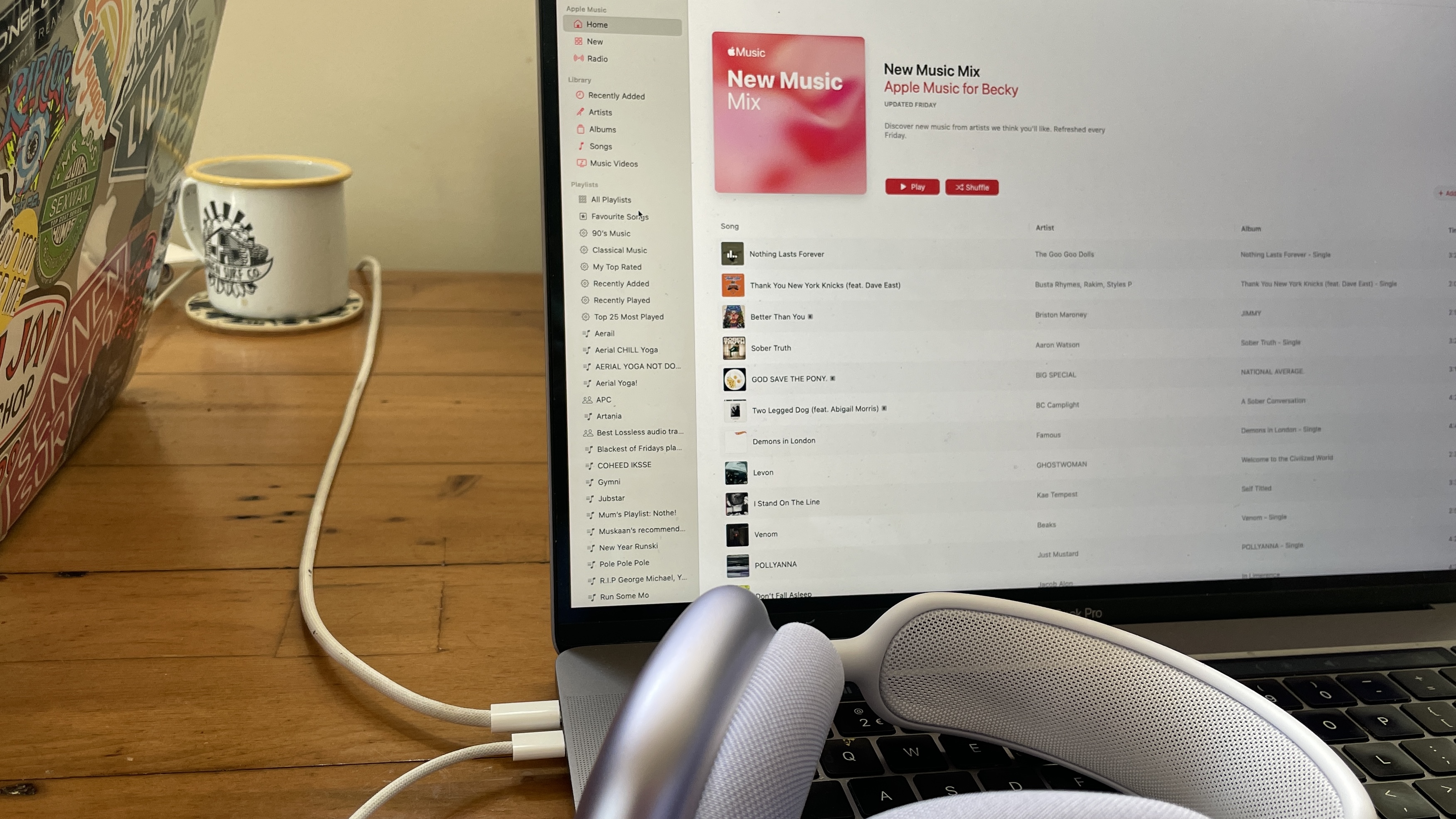 AirPods Max in purple hooked up to a source via USB-C