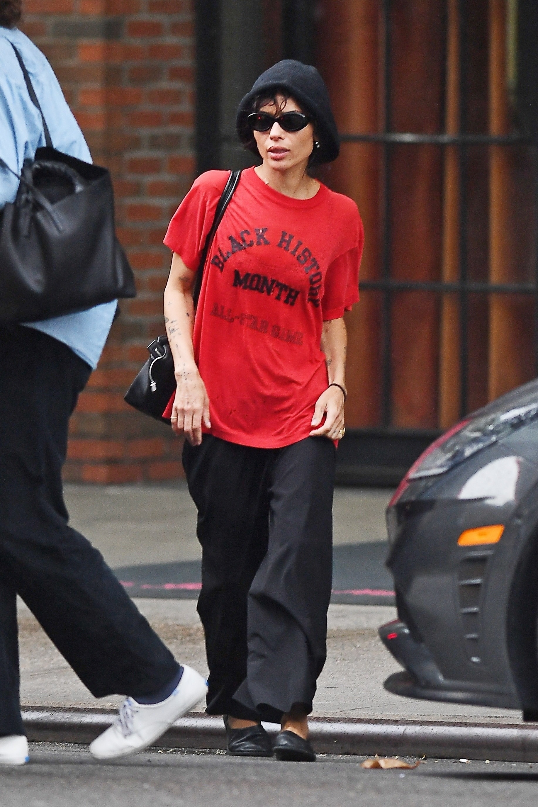 The day before, Zoë styled the same oversize tee.