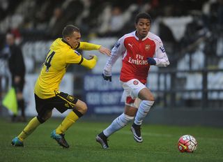 Donyell Malen of Arsenal takes on Rory Hale of Villa during the U21 Premier League match between Arsenal U21 and Aston Villa U21 at Meadow Park on December 21, 2015 in Borehamwood, England. (Photo by David Price/Arsenal FC via Getty Images)