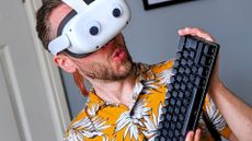 Ben Wilson from Windows Central wearing a Meta Quest 2 VR headset with stick-on cartoon eyes