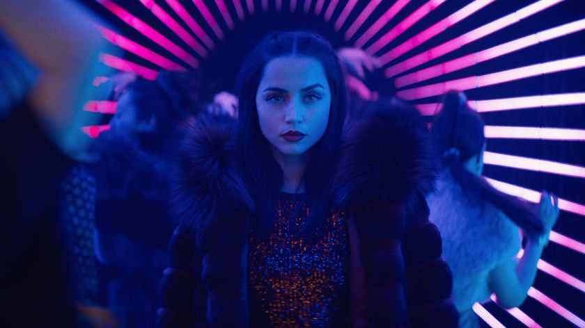 A still from &quot;John Wick&quot; spinoff &quot;Ballerina&quot; featuring Ana de Armas in a club