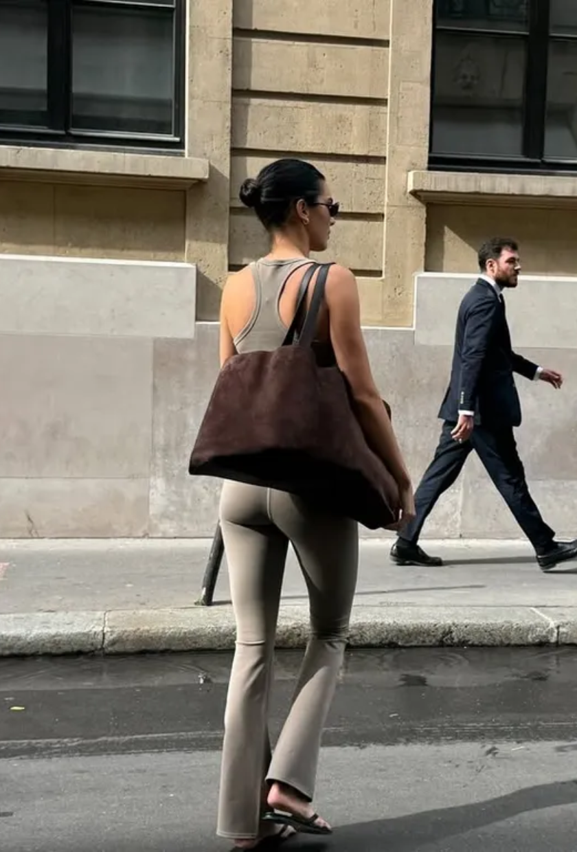 An image of @kendalljenner wearing flare leggings.