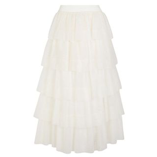 flat lay of never fully dressed ivory sheer ruffle skirt