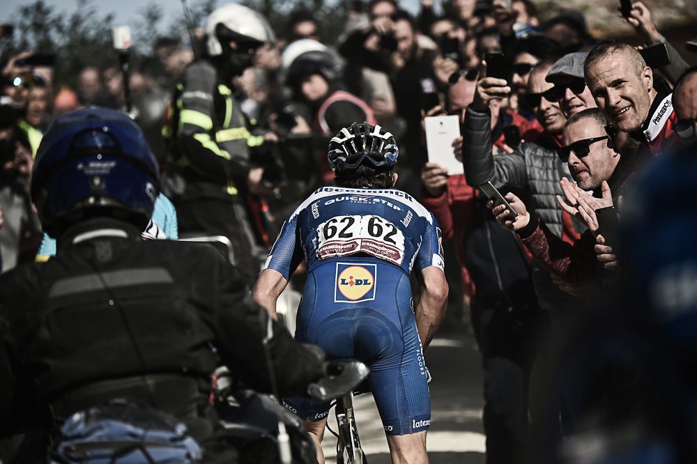 Julain Alaphilippe is surrounded by fans at Strade Bianche
