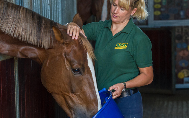 laura-with-bucket-and-horse-crop