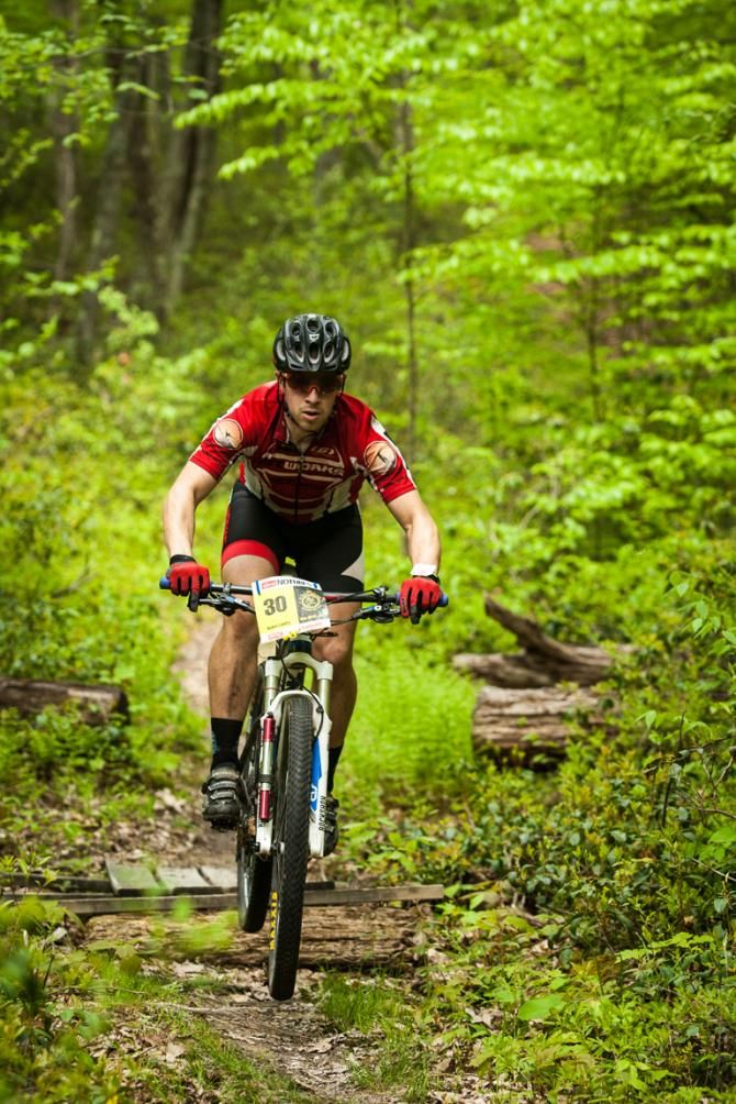 Andre Landry jumps a bridge on the Enduro Stage